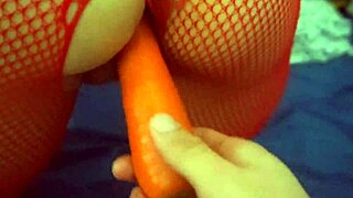 sexy girl enjoys her boyfriend masturbating her with a carrot