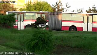 A pretty blonde participates in a risky public gangbang orgy on the street.