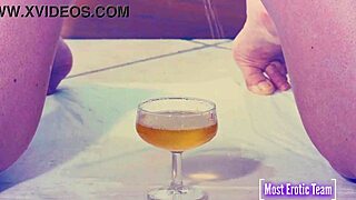 She pisses into glasses while her tits get wet