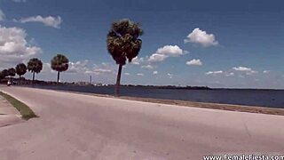 Hot redhead in swimsuit touches herself