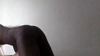 a latino guy sucks a black shemale's big cock in a deepthroat session