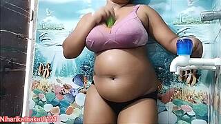 Indian desi girl Anjali Arora flaunts big assets in steamy contrast.