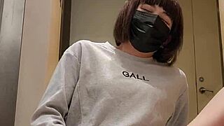 asian crossdresser in office masturbates waiting for passerby
