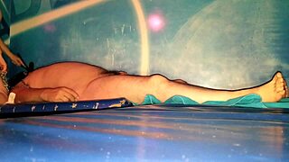 Slave Lies On Bed During Facesitting With Gag Dildo In Mouth And BDSM Elements