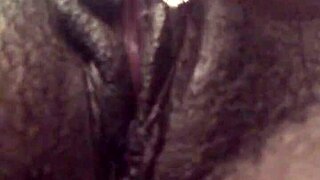 the tight pink pussy glistens wet with toys inserted deep