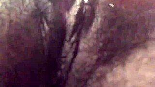 the tight pink pussy glistens wet with toys inserted deep