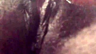 the tight pink pussy glistens wet with toys inserted deep