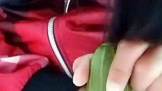 Vietnamese teen masturbates with cucumber.