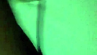 rubbing body oil on a black milf