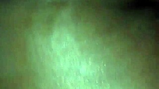 rubbing body oil on a black milf