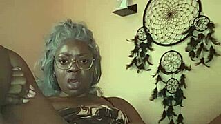 nae relaxes in bed, gently fingering herself with close up views of her ebony curves