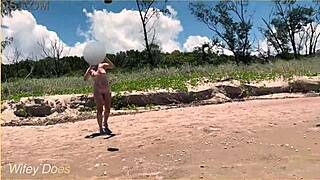 nude wife dares voyeur at clothed beach