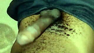 Is This Sexy Gay Twink Stroking His Monster Cock Solo at Home?