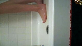 hot big tits girlfriend masturbates in shower with bottle