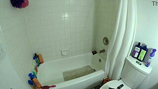 Angel lover enjoys a sexy bathing session in the shower with her latina partner