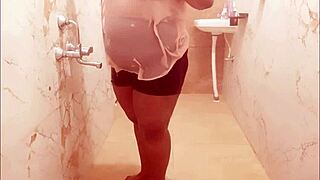 Thailand lady playfully bathes in the shower, showcasing her beauty