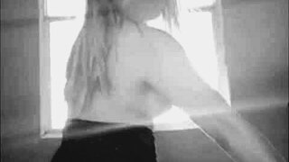 The hot latina neighbor teases in lingerie from the open window