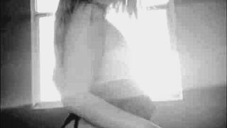 The hot latina neighbor teases in lingerie from the open window