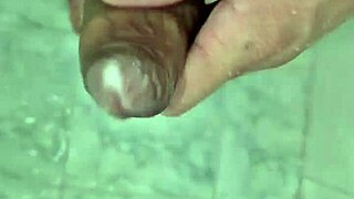 A young Brazilian twink enjoys a solo shower, his penis getting wet and babado