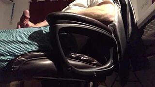 A guy strokes his gay partner's cock in this casual scene