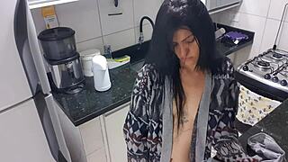 latina dame masturbates big tits in kitchen