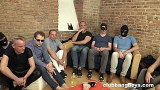 In this huge gay orgy, masked men in leather give blowjobs and deepthroats while bound in bondage.