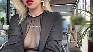 flashing tits in cafe, glass walls show all, no bra, oops!