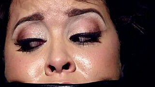 Tanned slut endures intense flogging while tied up in hardcore bondage.