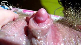 Big clit on a hairy sticky pussy up close
