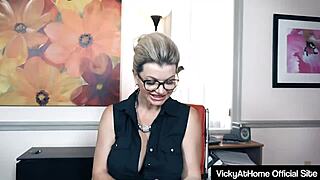 Big boobed Vicky Vette feels bored at the office and rubs her clit