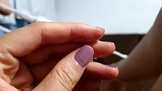 Latina pornstar masturbating intensely on wet sofa, cum dripping down her leg.