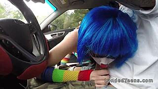 A clown teen sucks cock outdoors in POV.