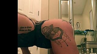 Sexy big booty tattooed chick twerking her ass on camera.