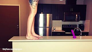 Ray Ray Xxx wipes counter, jumps on top, fucks sucks gives footjob to dildo 😈