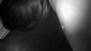 in the gay sauna, a man engages in an oral job with another visitor