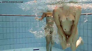 Iva Brizgina and Paulinka kiss passionately in pool