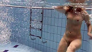 Iva Brizgina and Paulinka kiss passionately in pool