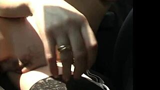 girl flashes her huge natural tits at the park.