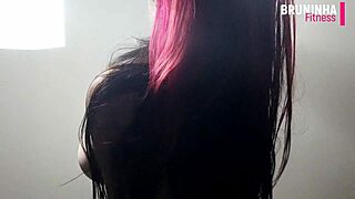 Check out this athletic Brazilian cowgirl showing off her silicone tits.