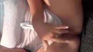 squirting babe films herself in front of the mirror, it's homemade webcam fun