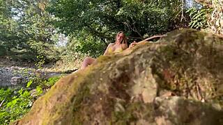 Big-titted beauty caught masturbating by river, lets stranger take her holes