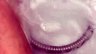 Hungarian babe takes off nylon and enjoys footjob in shower.