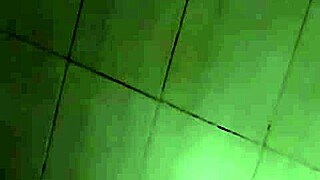 Asian beauty exposed by the moonlight while taking a shower