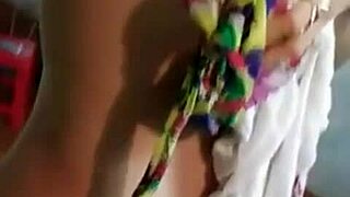 Asian beauty exposed by the moonlight while taking a shower