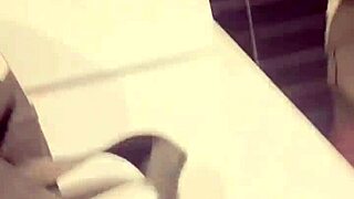 Gay men in bathrooms get handjobs.