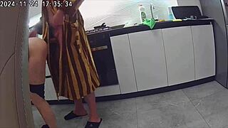 wife sneaking around with hubby's best pal in kitchen