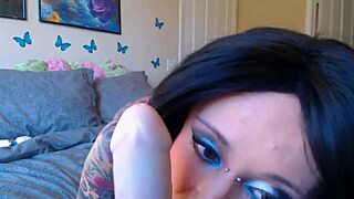 i'm an amateur milf with big tits and piercings riding my dildo on webcam