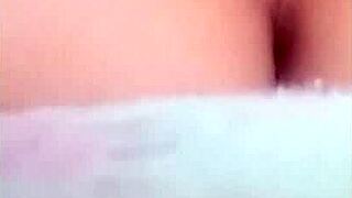 Chinese babe caught masturbating in hot solo action