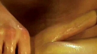 Enjoying an erotic gay massage session on the table