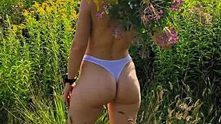 girl with small tits walks in nature wearing short shorts and t-shirt, anna mole